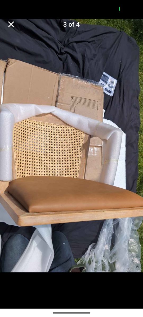Unopened Dining Chair with Rattan Back and Faux Leather Cushion