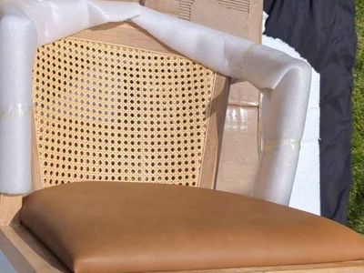 Unopened Dining Chair with Rattan Back and Faux Leather Cushion
