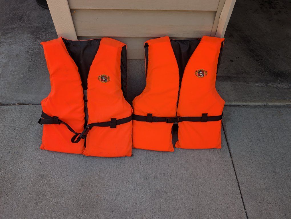 Pair of Orange Life Vests / Personal Flotation Devices. small