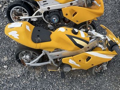 Two Yellow 49cc 2 stroke Mini Pocket Bike Motorcycles
