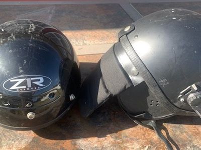 2 motorcycle helmets