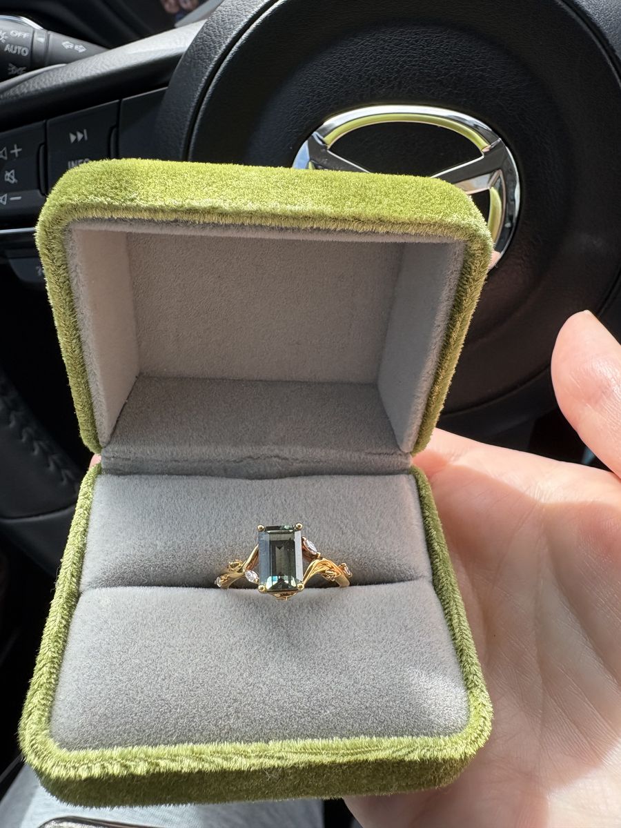 Emerald cut Green Sapphire engagement ring