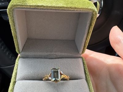 Emerald cut Green Sapphire engagement ring