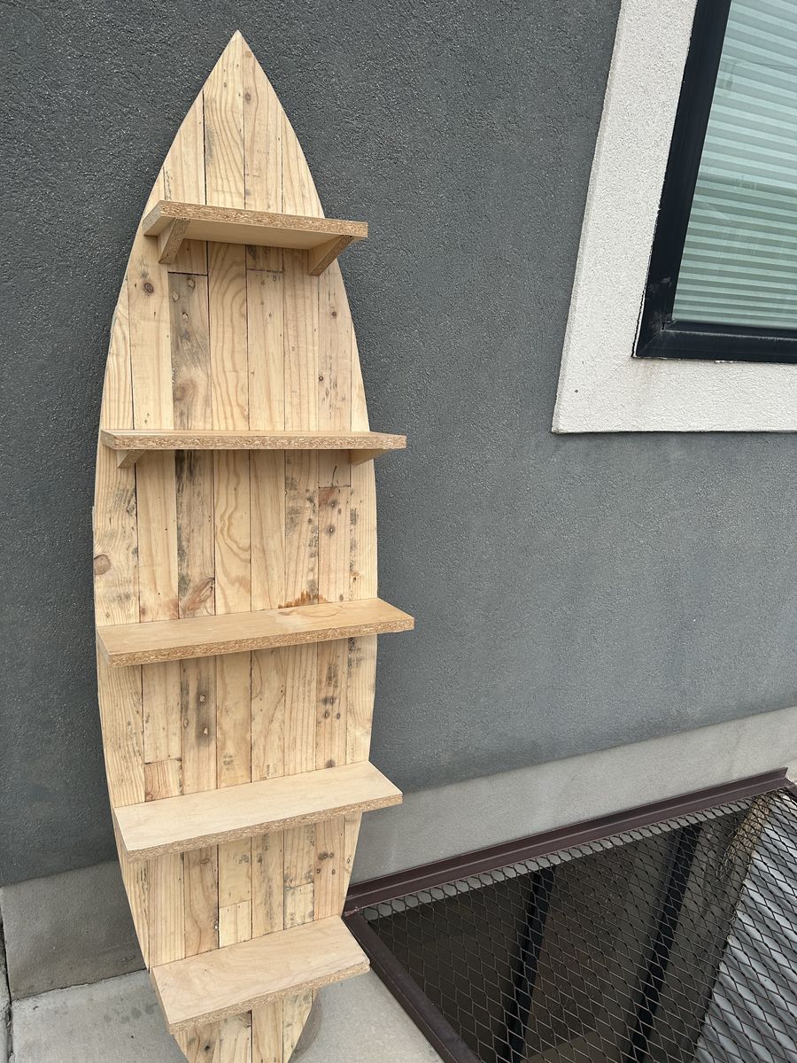 wooden surf board with wooden shelves