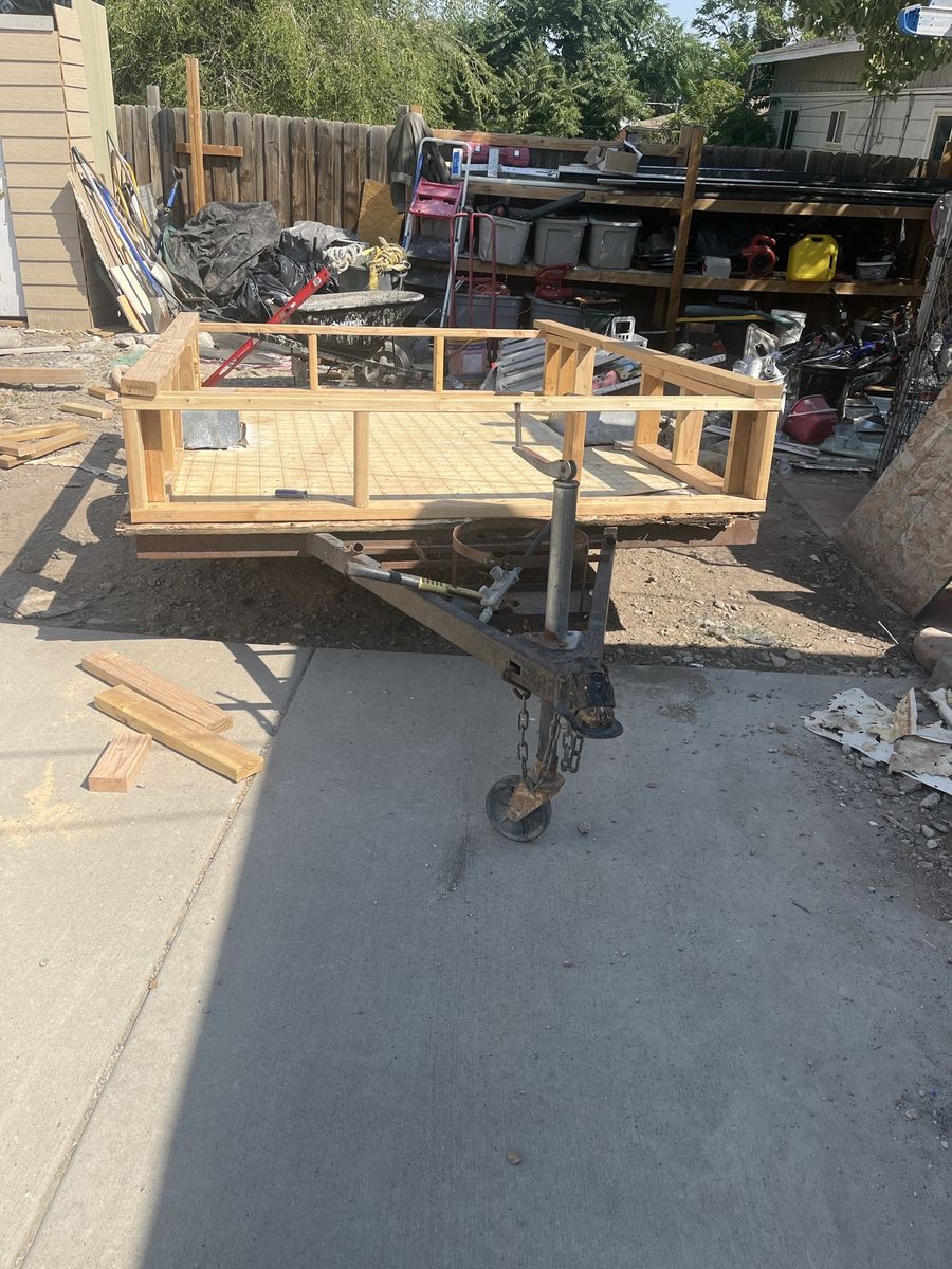 Single Axle Utility Trailer with Wooden Railing Frame and Jack
