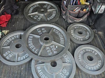 Standard Cast Iron Plates (Total 210lbs) less than dollar per pound wont last long