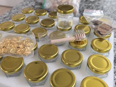 30 Mini Hexagonal Glass Jars with Gold Lids, Honey Dippers, Bee Charms & "Love" Tags