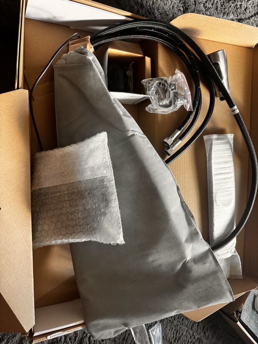 Brand New Silver colored Kitchen Faucet in Box