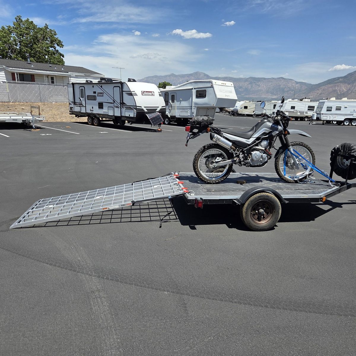 Like new Black Widow Aluminum Loading Ramp - 1500 lbs Capacity, Folding for loading ATV/Motorcycle/small UTV. Safety straps incl