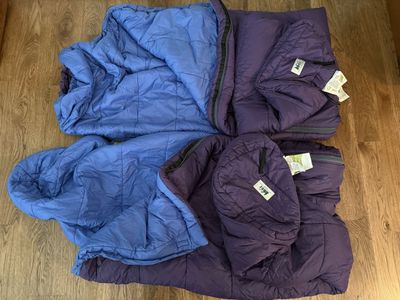 Two REI lightweight 3 season 30F synthetic sleeping bags with stuff sacs $60 each. Excl cond like new - used only a few times.