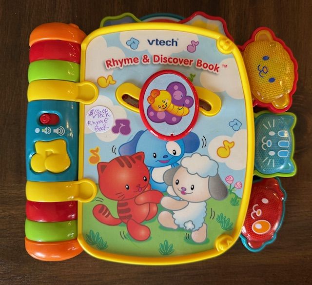 VTech Rhyme and Discover Book Toddler/Kids Toy with Sounds and Touch Feel Learn