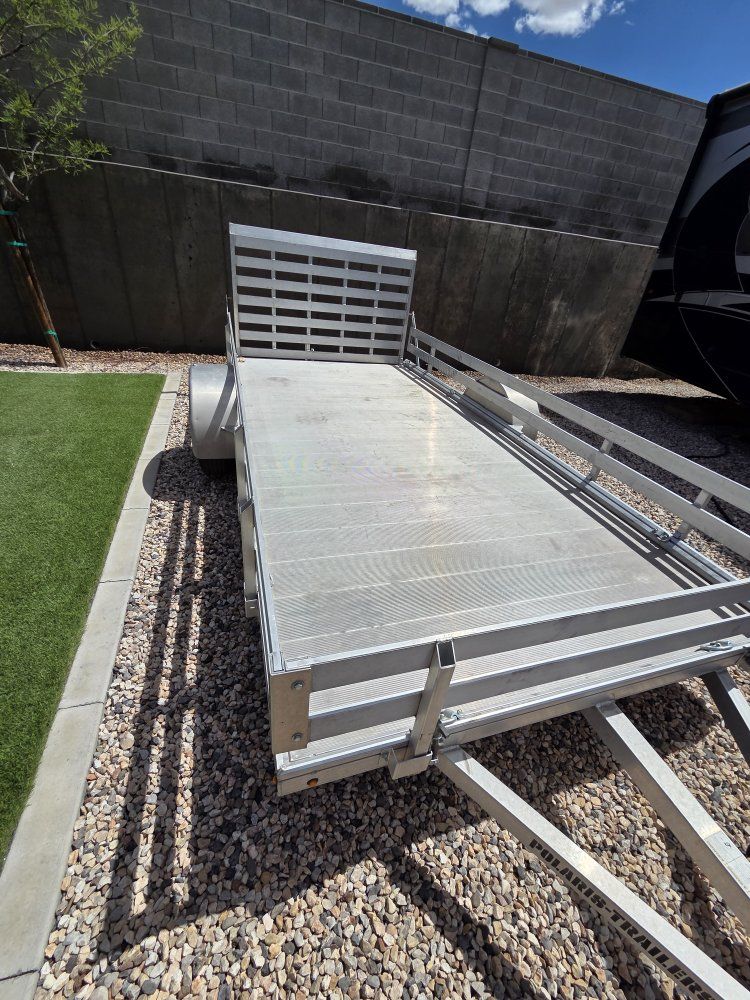 Polaris 14x6½ foot utility trailer.