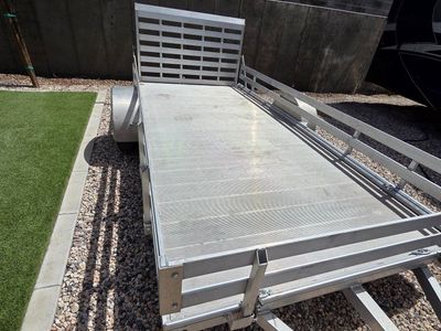Polaris 14x6½ foot utility trailer.