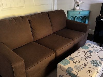 Pull out sofa, Two Chairs and Ottoman