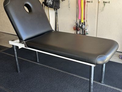 Adjustable Black Massage Table/Lounge Chair with Face Hole - Portable Therapy Bed. 74” long x 28” wide x 28” tall.