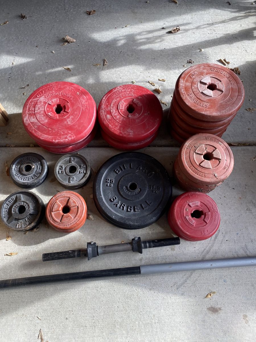 Over 200 pounds of barbell plate weight weights