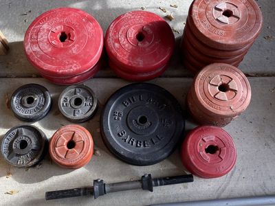 Over 200 pounds of barbell plate weight weights
