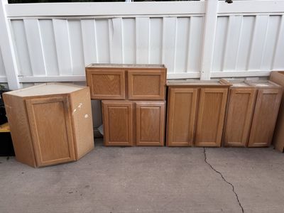 Great set of oak garage/shed cabinets.