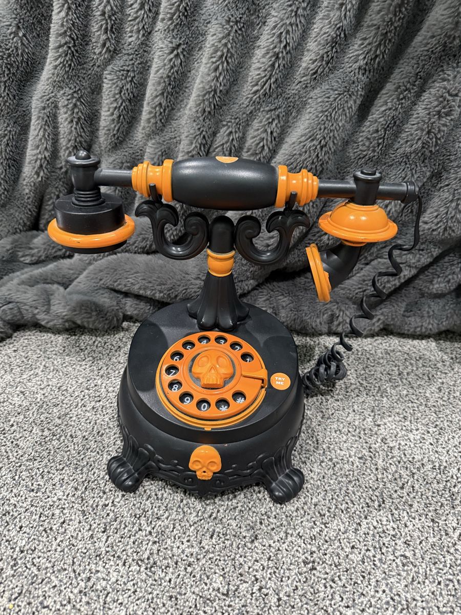 Spooky Halloween Decor Animated Skull Rotary Phone Prop Black & Orange