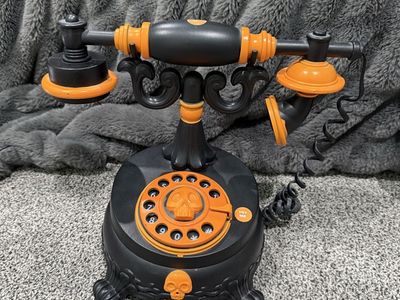 Spooky Halloween Decor Animated Skull Rotary Phone Prop Black & Orange