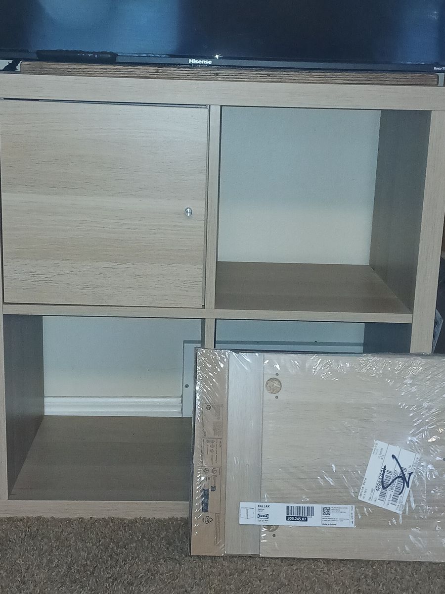 IKEA KALLAX Shelf Unit with Door Insert - Light Wood Finish, 2x2 Cube Storage