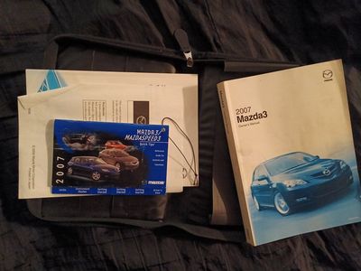 mazda 3 owners manual/guide w/ carry case