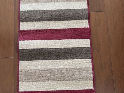 New rug with rubber back 19”x33”