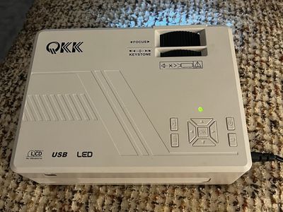 QKK Portable LED LCD Projector with Focus and Keystone Adjustment