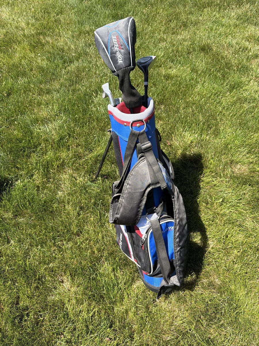 Junior top elite golf bag, irons, putter and driver