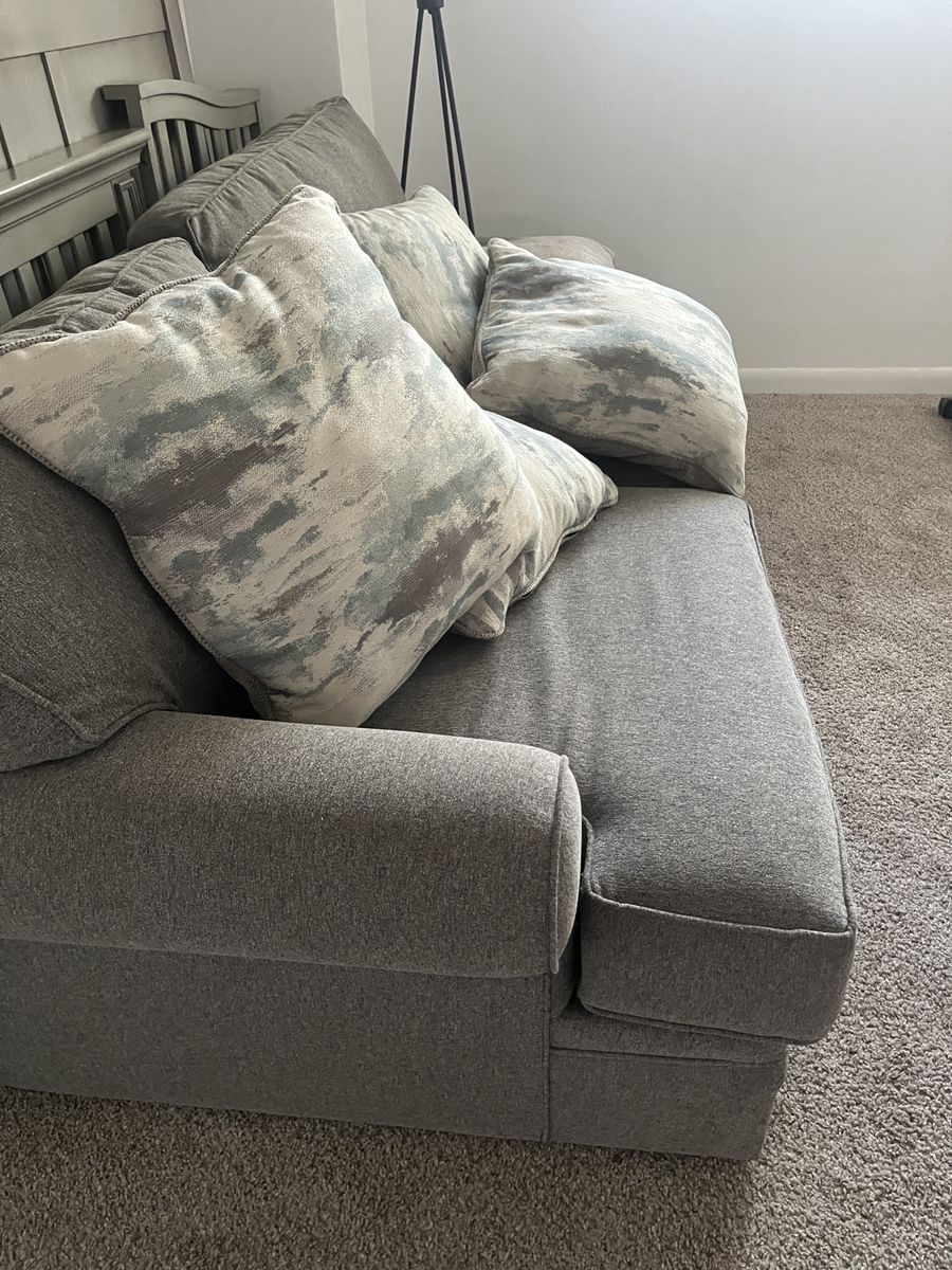 Gray Upholstered Fabric Sofa with Matching Throw Pillows