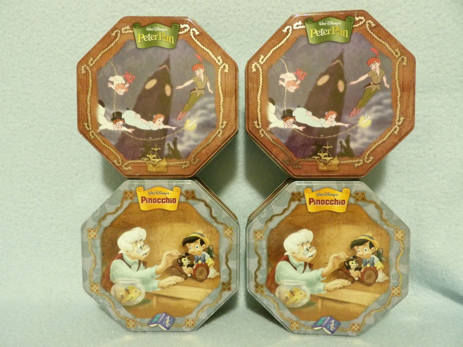 4 Lot Collectible Disney Peter Pan & Pinocchio “Famous Amos” Christmas Cookie Tins (Empty)