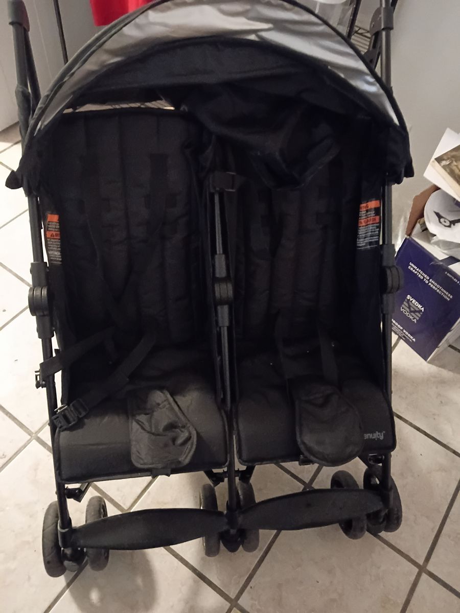 Side by side black double stroller