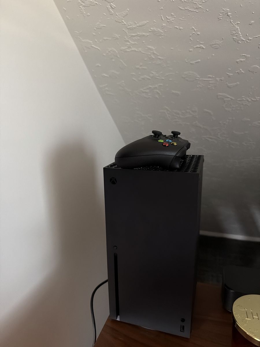 Brand new played it only a few times. Microsoft Xbox Series X Console 1TB Black with Wireless Controller