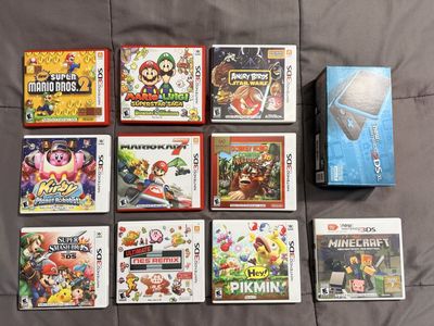 Nintendo 2DS XL Black and Turquoise and 3DS Game Bundle