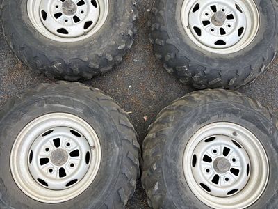 Honda rancher factory tires and wheels 4x110