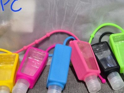 New 6PC Travel Size Hand Sanitizer Bottle Holders, Multicolor Silicone Sleeves with Hooks.