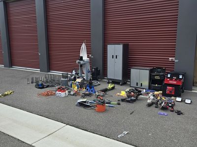 Gladiator Tool shop cabinets, shop vacs, rolling tool boxes, power tools, hardware and odds and ends.