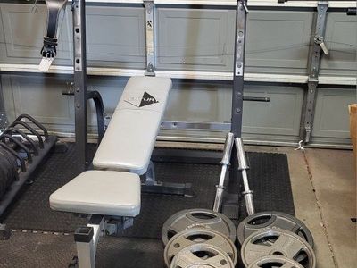Bench and 277 pounds of weights