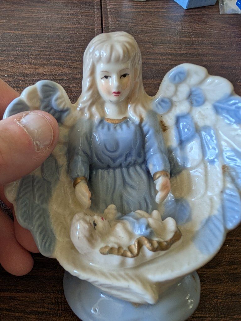 Porcelain Guardian Angel with baby figuring
