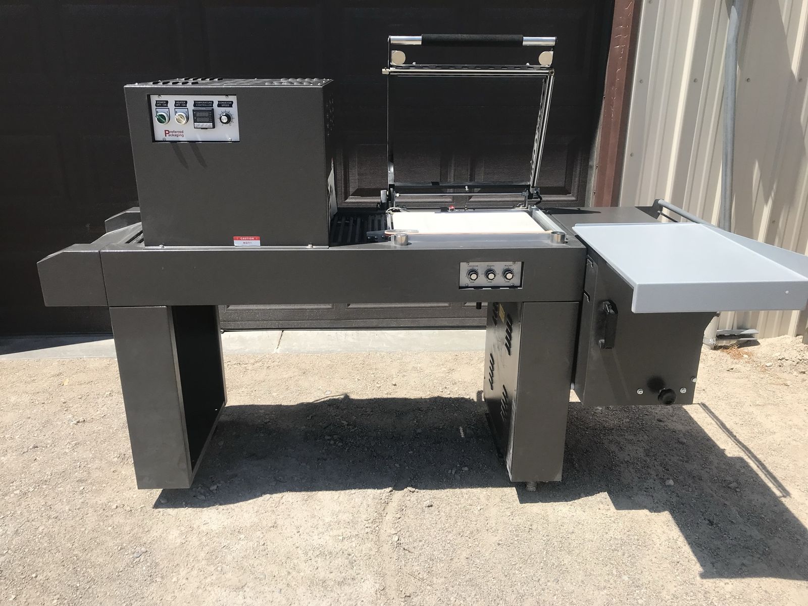 Excel packaging shrink wrap machine