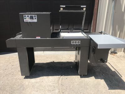 Excel packaging shrink wrap machine