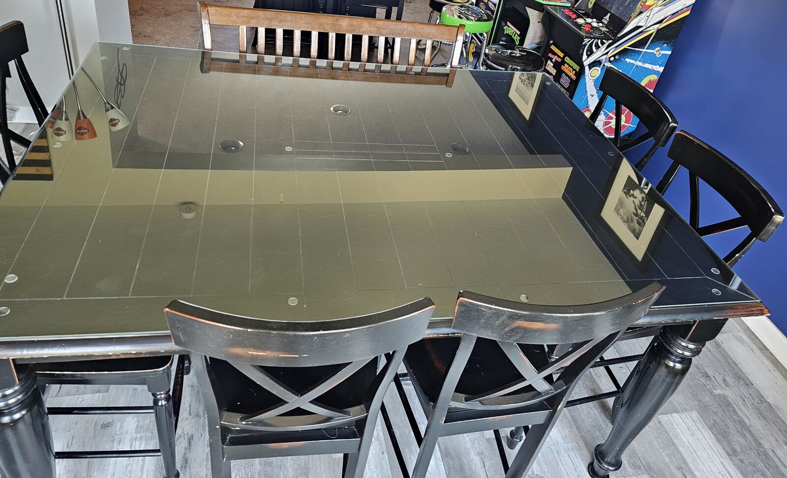 Counter height table and chairs with a real glass cover protector