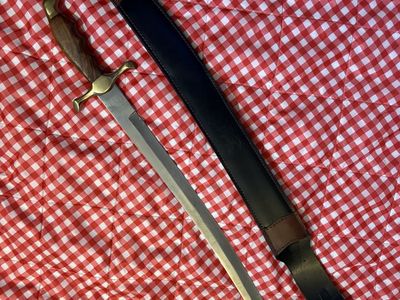 Short Falcon saber sword with scabbard