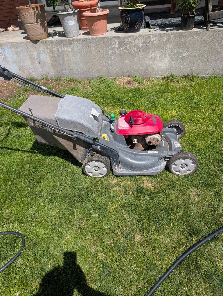 Honda HRX Versamow 4-in-1 Self-Propelled Gas Walk-Behind Lawn Mower w/ Bag