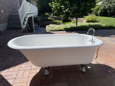 5' Vintage cast iron chrome claw tub/ with faucet & drain
