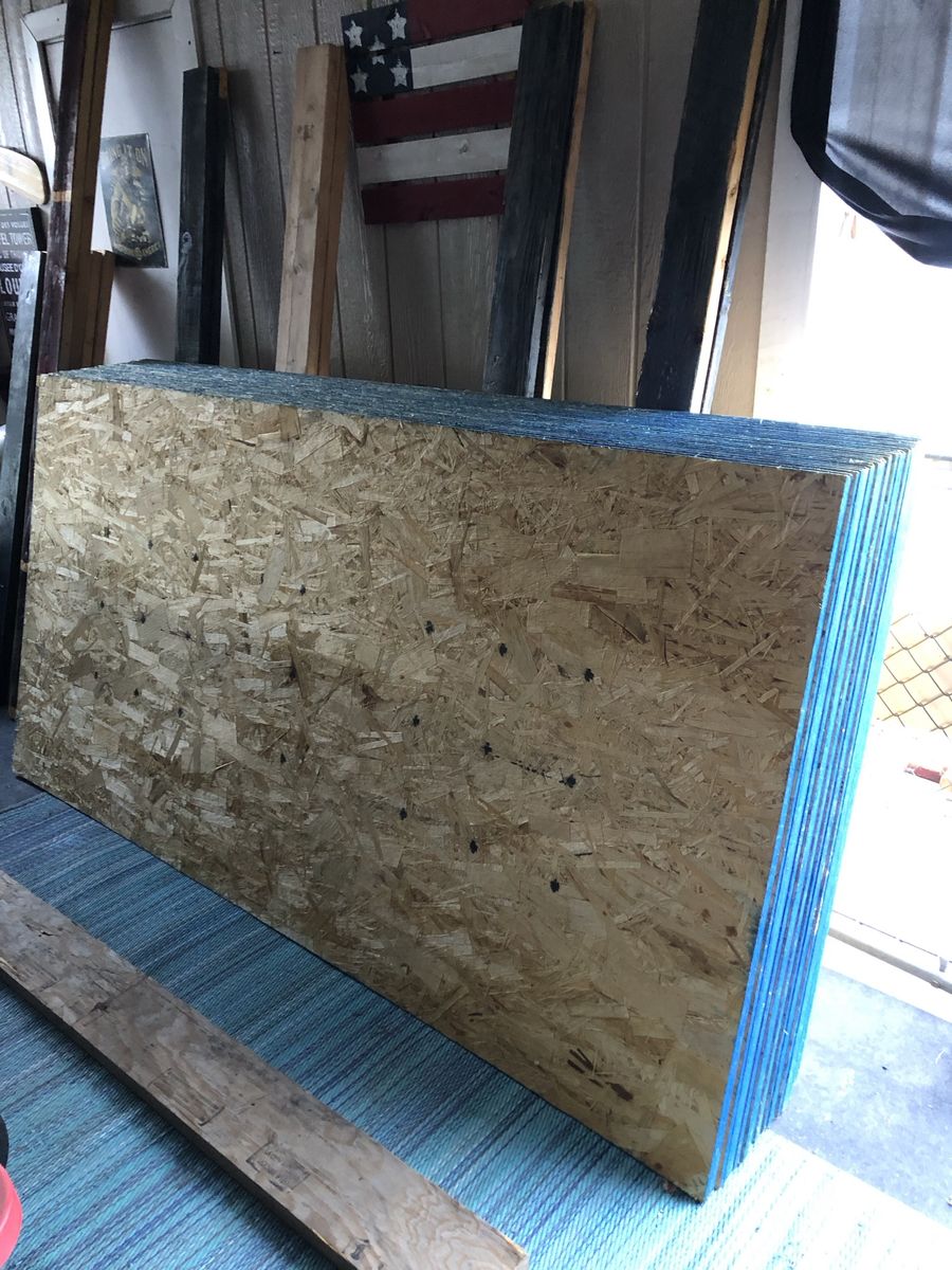 OSB Plywood Sheets Stack - Building Material