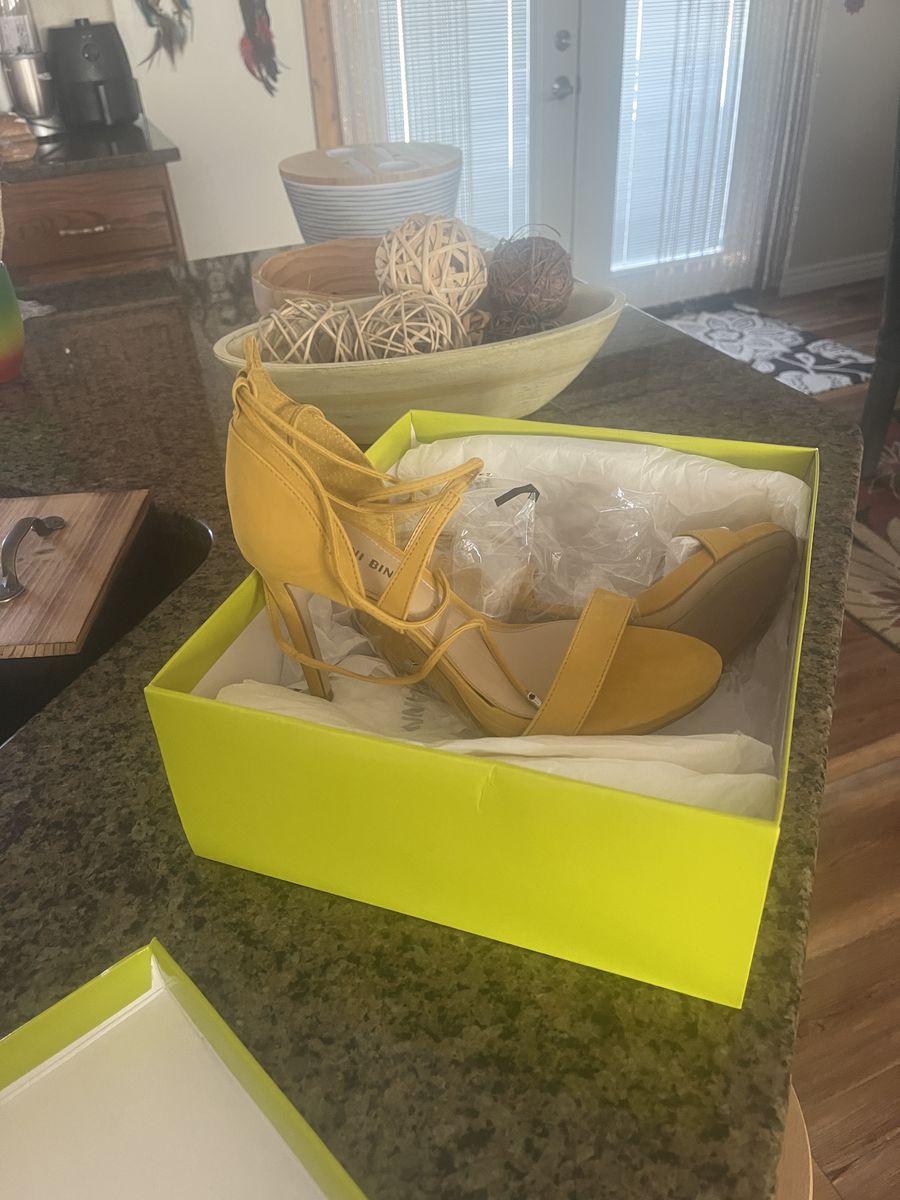 Woman’s high heeled shoe
