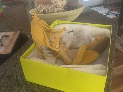 Woman’s high heeled shoe
