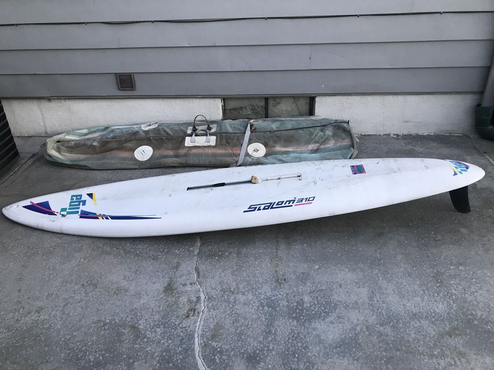 Tiga 13 foot windsurfer with carbon fiber mast , sail and boom bar