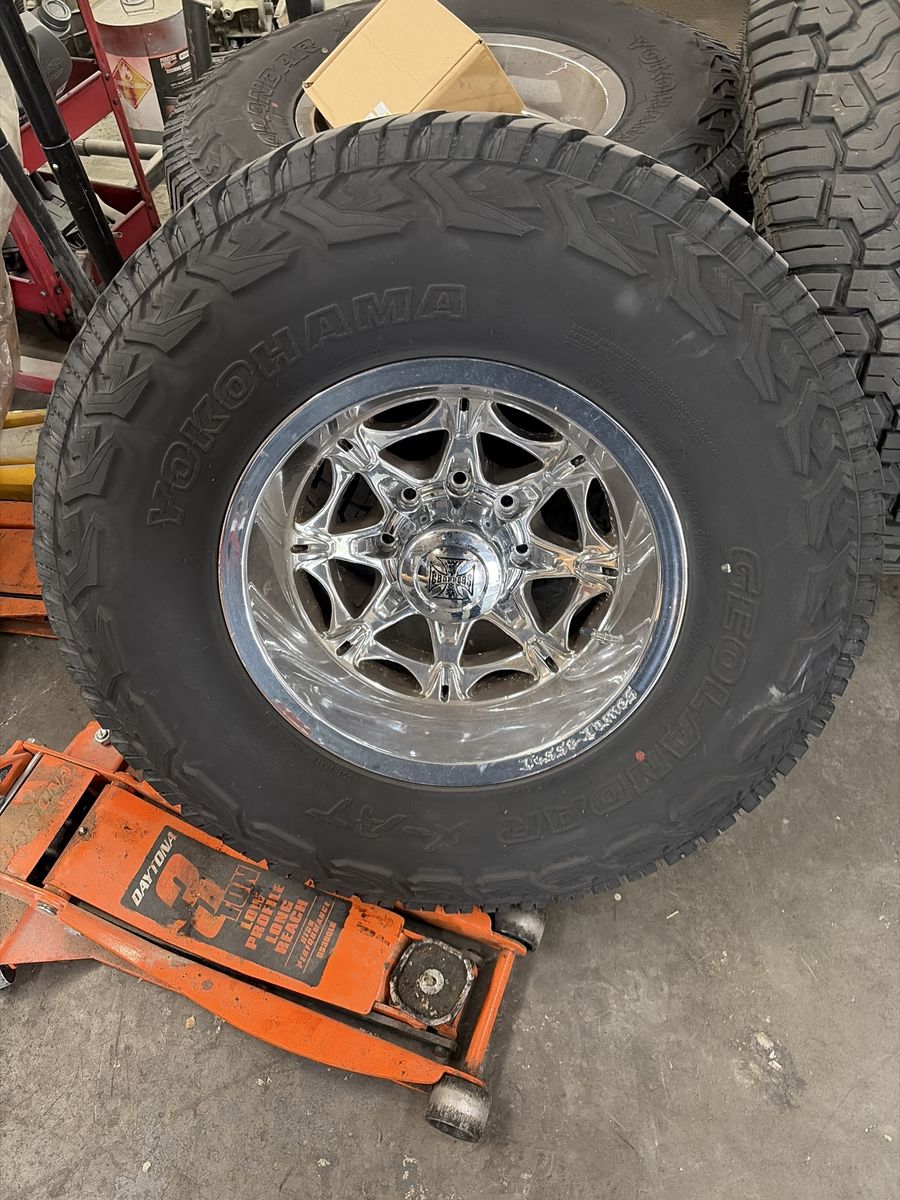Jesse James West Coast Choppers 18x10 Chrome Wheels with Yokohama Geolandar X-AT Tires 8x6.5 Lug Pattern 37X 13.50 set of 4